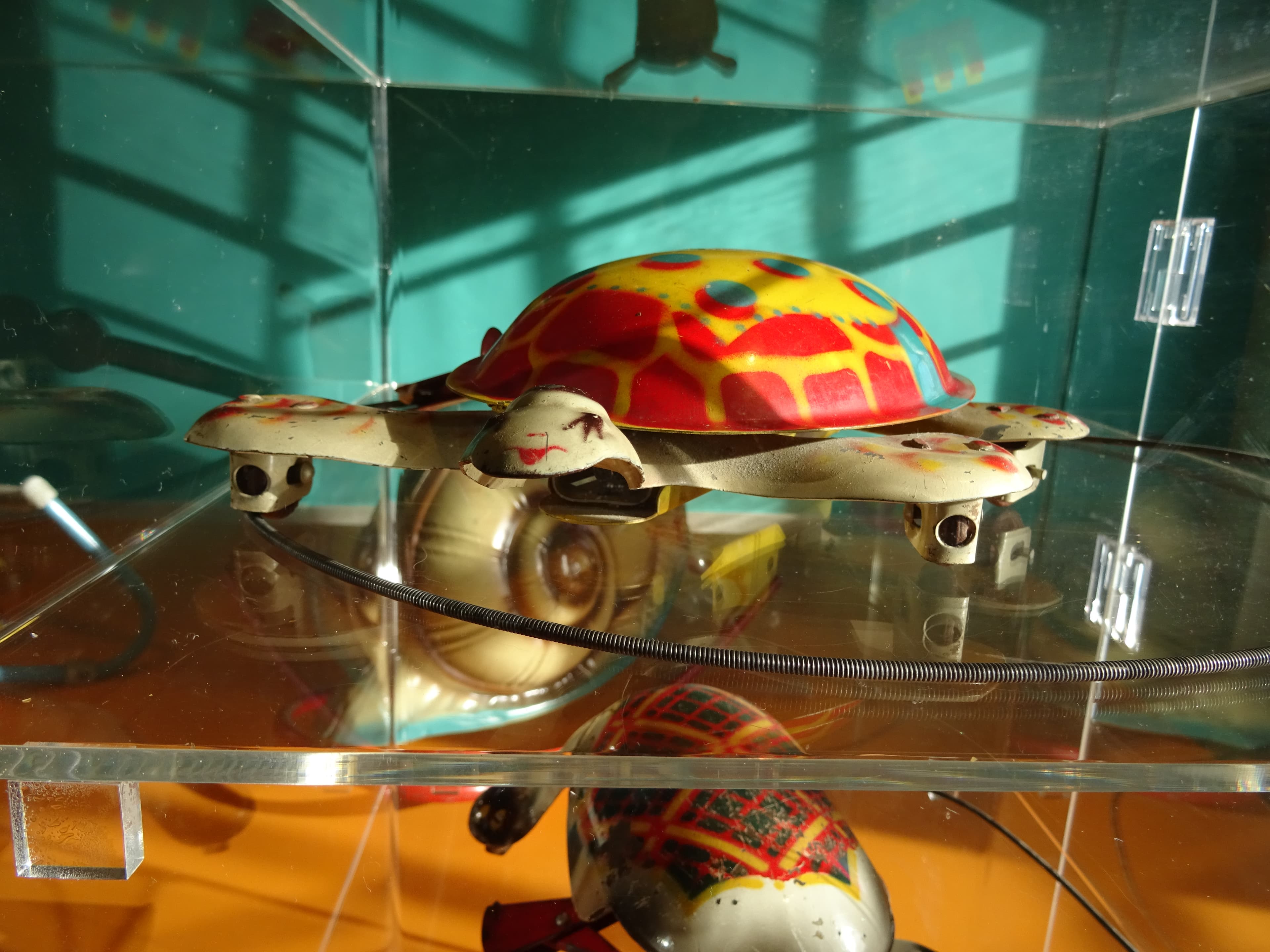 Close view of toy products displayed in a showroom cabinet